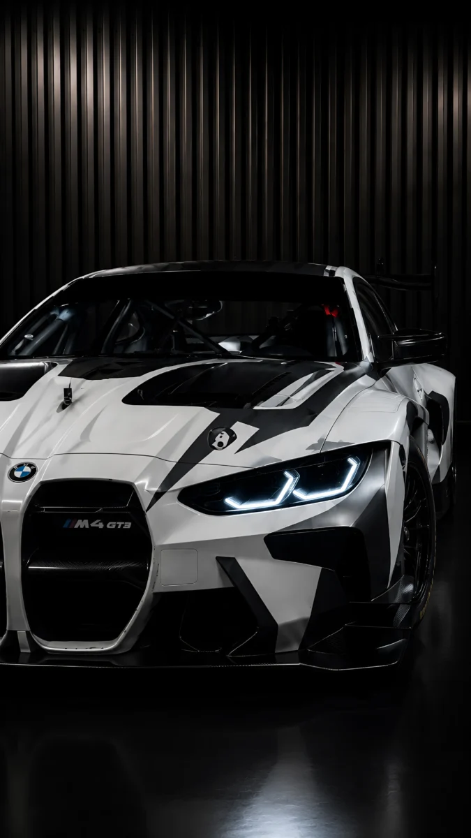 Hd image of a white and black BMW M4 GT3 race car, perfect for bmw car wallpaper, bmw m4 gt3 wallpaper phone, and bmw m4 images.