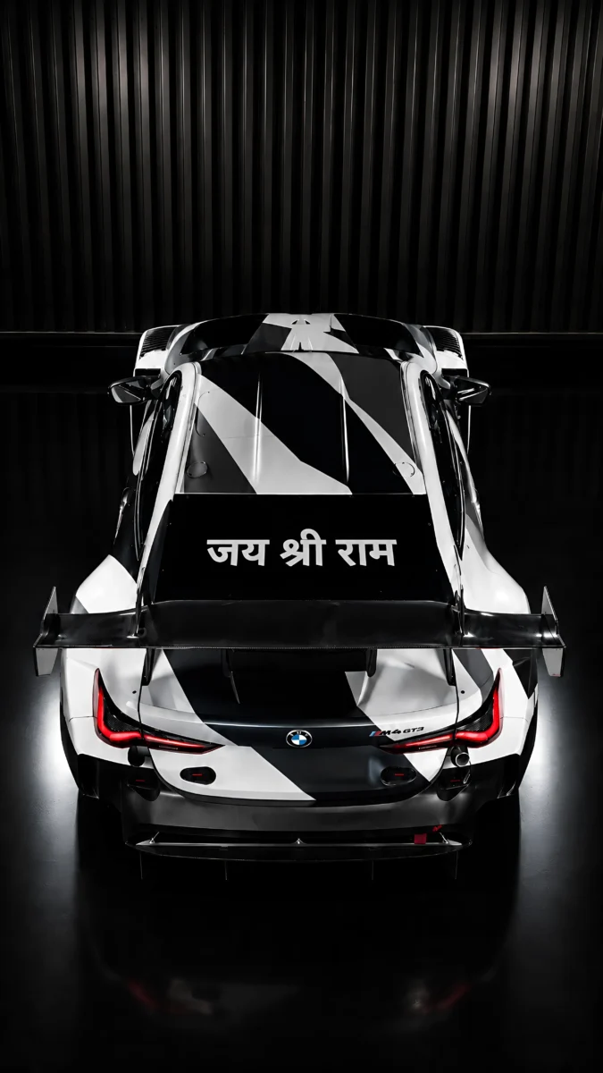 Hd image of top rear view of BMW M4 GT3 with Jai Shree Ram text on rear wing, perfect for bmw car wallpaper, bmw m4 gt3 wallpaper phone, and bmw m4 images.