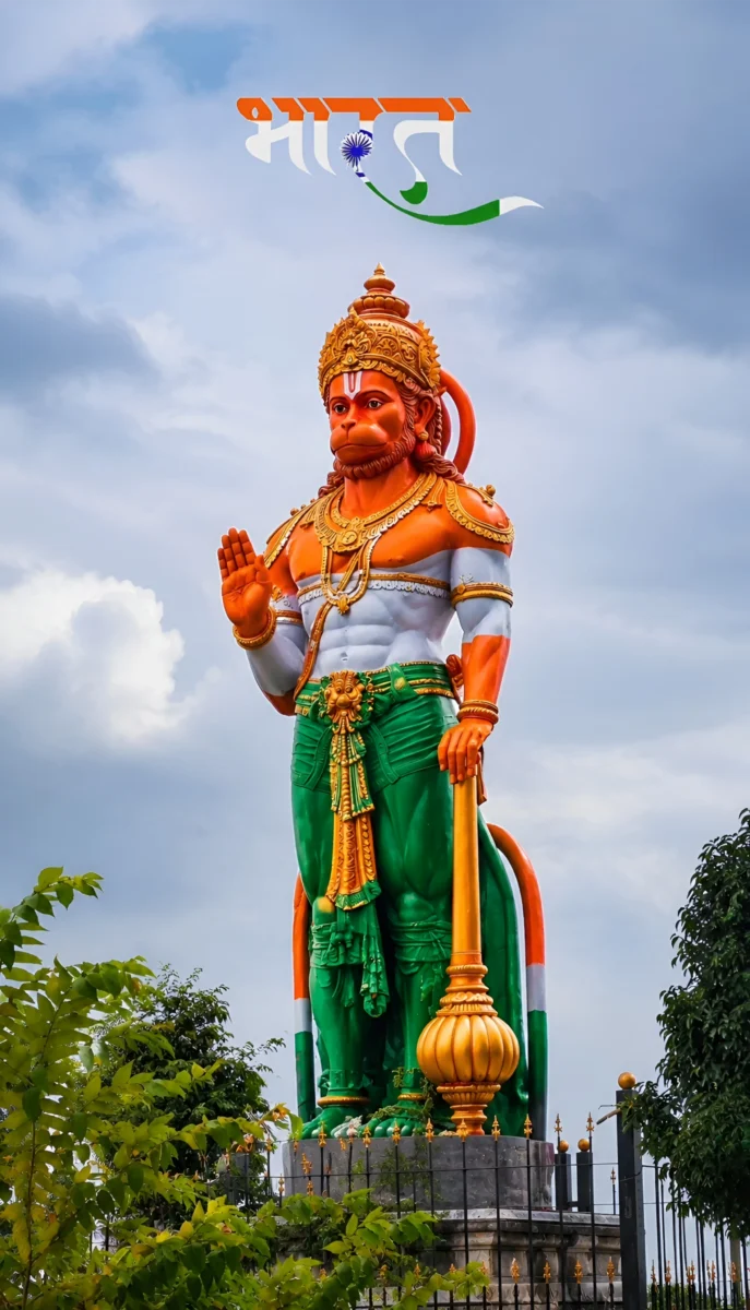 Hd image of Lord Hanuman statue painted in Indian tricolour flag theme with Bharat calligraphy in the sky, perfect for indian flag wallpaper hd, indian flag hd wallpaper, and tricolour flag wallpaper.