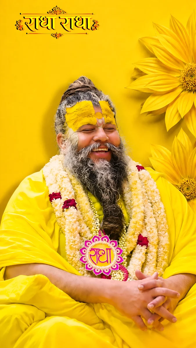 Hd image of Premanand Ji Maharaj smiling joyfully in yellow robes with a beautiful flower garland and folded hands, surrounded by yellow flowers and Radha Radha artwork, perfect for premanand ji maharaj photo, premanand ji maharaj hd wallpaper, and premanand maharaj wallpaper.