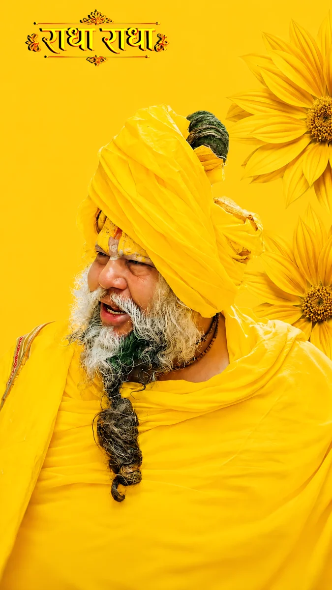 Hd image of Premanand Ji Maharaj wearing a yellow turban and yellow robes with a joyful expression, surrounded by beautiful yellow flowers and Radha Radha artwork, perfect for premanand ji maharaj photo, premanand maharaj wallpaper, and premanand ji maharaj hd wallpaper.